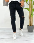 JEANS NERO CON ROTTURE SDL OUTFIT
