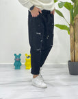 JEANS NERO CON ROTTURE ED ELASTICO IN ITA 505